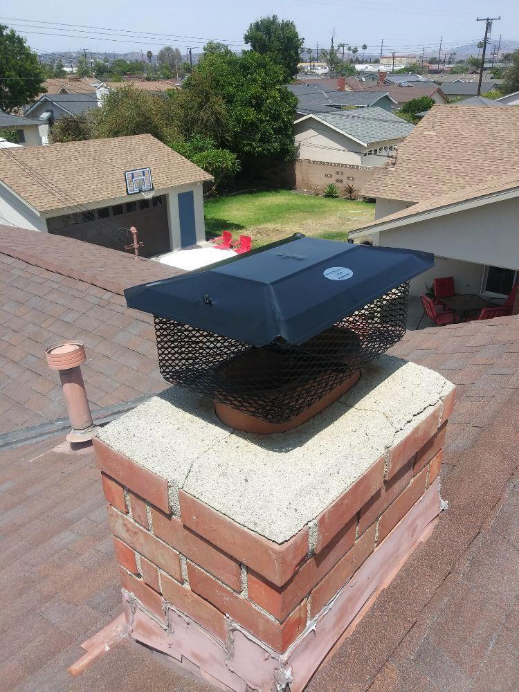 Chimney with a new cap and repointed brick, from MC Duct Cleaning's own site